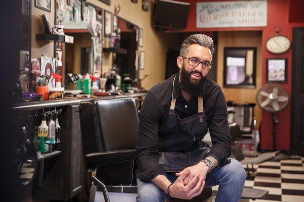 Miguel Velez III, owner and barber of Miguel's Riverside Barber Shop, Bristol, PA