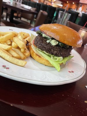 Blackened cheese burger with fries