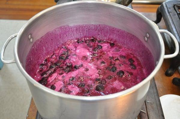 making the blueberry jam