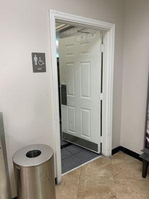 Dillard's men's restroom first floor in hallway orlando fl 2:02 pm January 13 2024