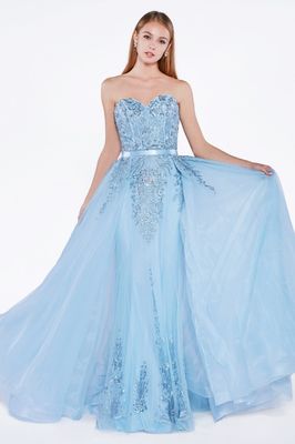 Strapless gown with jeweled lace details and detachable tulle overskirt.