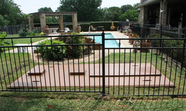 ArmourGuards GuardCon IG 24 person storm shelter installed in the back yard of a home in Colleyville, Texas