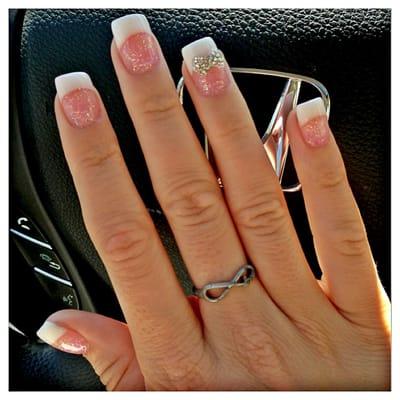 New nails by Nikki!! Pink and white with diamond bow!