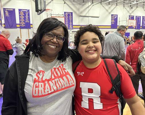 All smiles at St. Pius because the sports area was great and well-maintained. (And big smiles-my young wrestler won both his matches.)