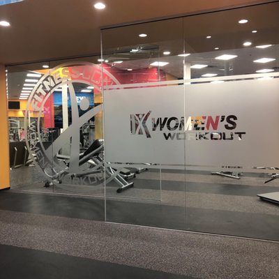 Women's only workout area with cardio theater