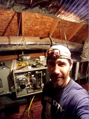 Danny working on an attic installation