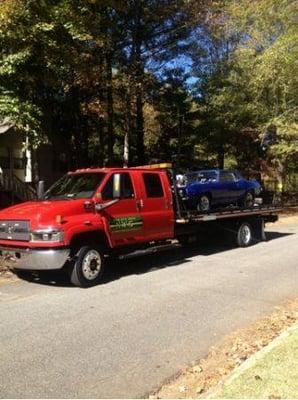 towing a 69 Chevy Camaro to the dragstrip