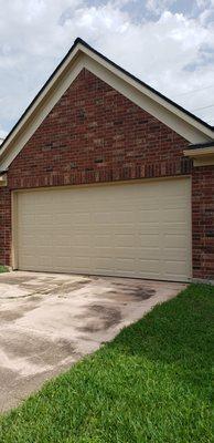 Exterior painting including garage door