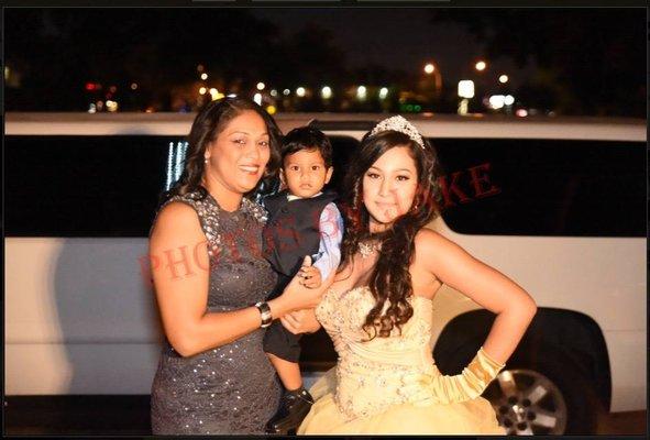 One of our limousine customers arriving to her Sweet 16 in style with our White 14 Passenger GMC Limousine.