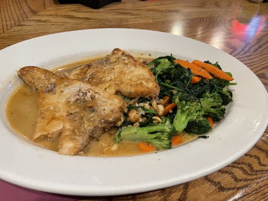 Swordfish in garlic wine sauce with vegetables special.