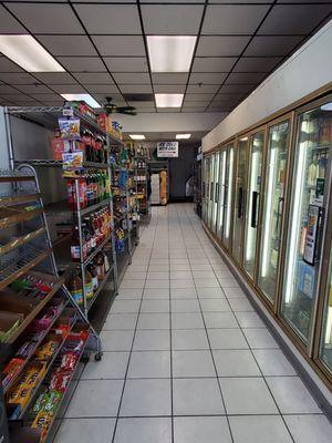 Walking inside for the last time as I shop for clearance items at Mario's Corner Market, local for 15 years. 8/30/2024