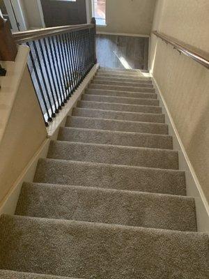 New carpet on stairs and porcelain tile throughout remainder of home