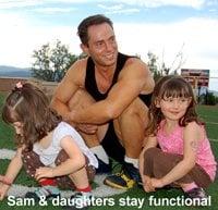 Two of Sam's 3 Daughters teaching him proper squat form effortlessly.