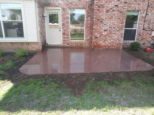 This was a 15'×18' patio that is color matched with the brick of the house and is broom finished to provide slip resistance