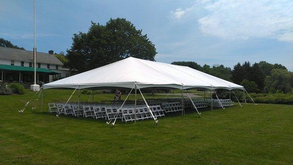 Tented ceremony seating on a gorgeous summer day!