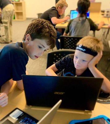 Kids learn problem solving and critical thinking while building video games.