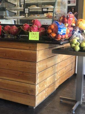 Fruits & pastries at right of ordering counter