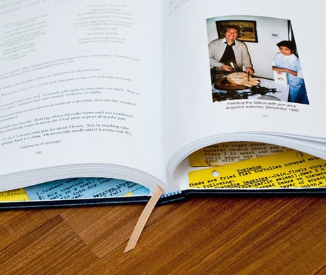 Detail of limited edition cookbook binding with custom end sheets and ribbon bookmark