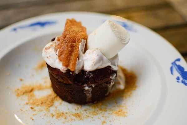 S'more brownie stuffed with marshmallow gelato  topped with marshmallow  cream and caramel caramel churro