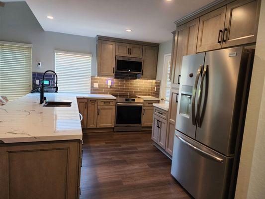 Love that luxury vinyl floor...notice the great paint on the walls and ceiling....