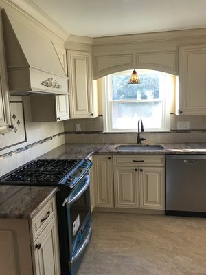 Crema Bordeaux granite with Custom cabinetry Installed by our team of professionals!