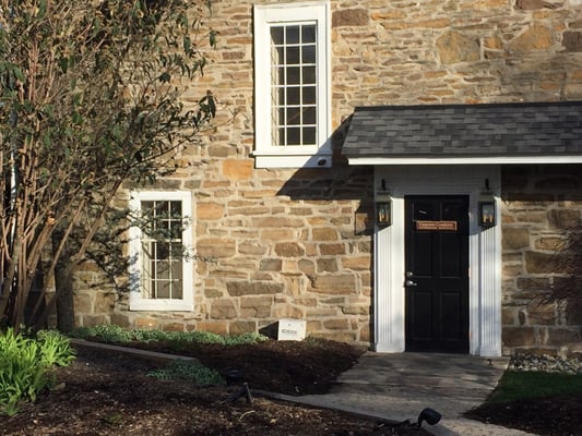 Entrance door to the building which is located on the corner of Germantown Pike and Valley Forge Rd.