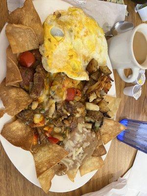 Steak Ranchero with refried beans and potatoes