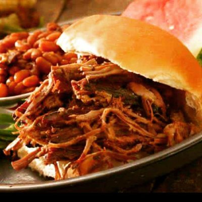 All good things come to those who wait. Well wait no more, as we just pulled a batch of Pulled Pork out of our ON SITE Smoker!!!