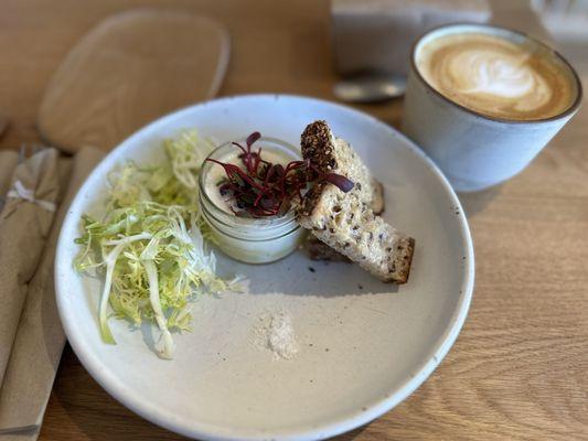 Coddled egg and oat milk latte