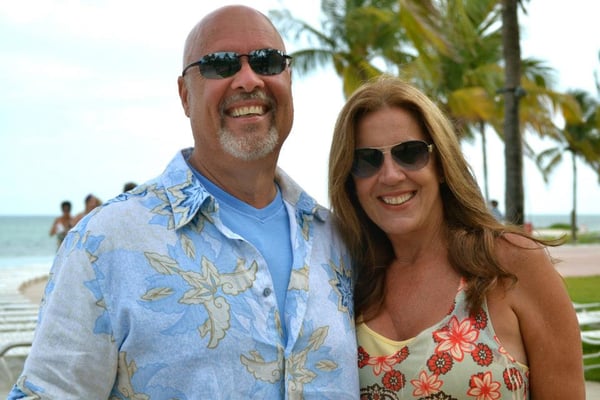 Zona Horton, Realtor, with her husband Jim at a beach-front wedding.