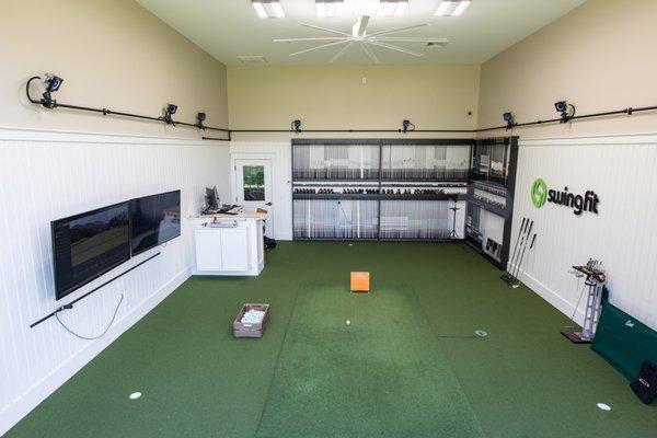 Indoor/outdoor bay allows us to fit in all weather condition while also enabling full ball flight.