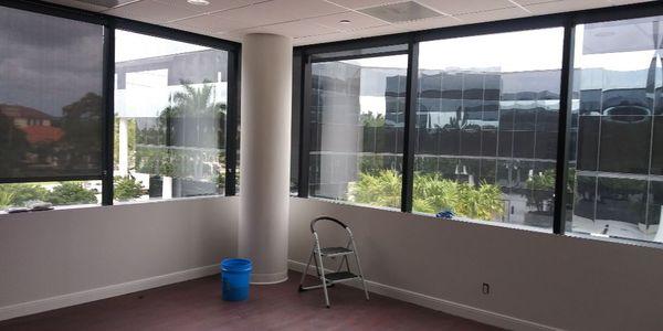 Cleaning windows at Lesser Lesser Landy and Smith new location Boca Raton