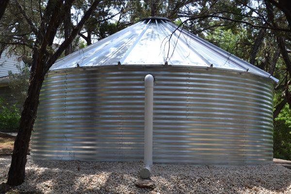 6" PVC overflow pipe on backside of 18,800 gallon steel tank