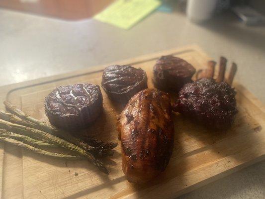 3 bacon wrapped Filet mignon, venison ribs and chicken breasts