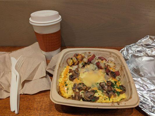 Large latte and a mushroom power breakfast (vegetarian)