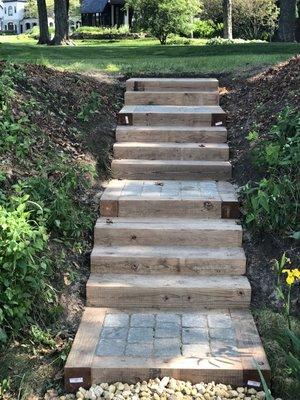 Beautiful timber and stone stairs that will add a wonderful touch to any outdoor area.