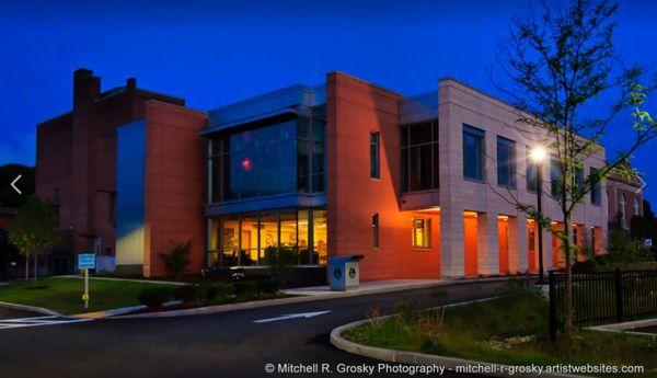 The rear of the library as night falls