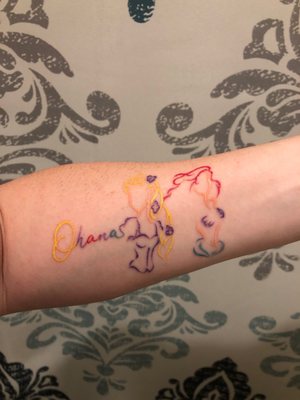 Disney tattoo: Ohana(means family). Rapunzel and Ariel