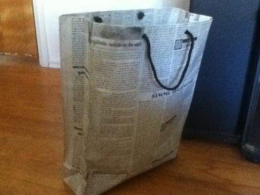 Recycled newspaper bag they gave me :)