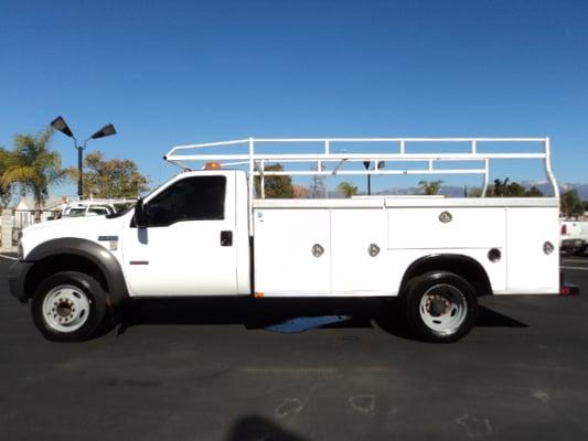 Here's a well maintained Ford F450 with custom ladder rack and slide top utility bed. Nice truck with the Powerstroke diesel !