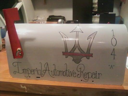 The Maserati resembles a crown so we put it on the new mailbox!