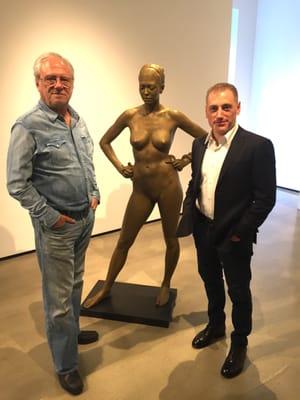 Louis K. Meisel and sculptor Brian Booth Craig