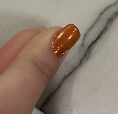 Difficult to see because of the polish- this nail has scratches and bubbles