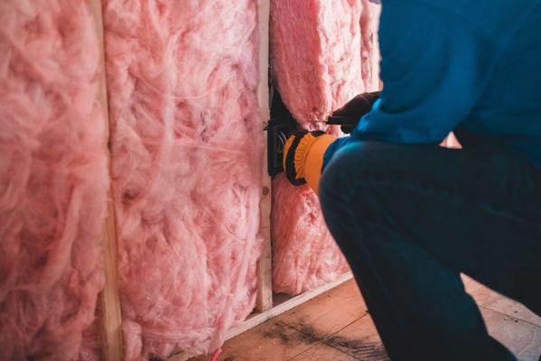 Fiberglass Batt insulation installation