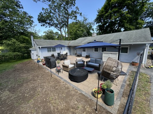 Set up with patio furniture post-construction.