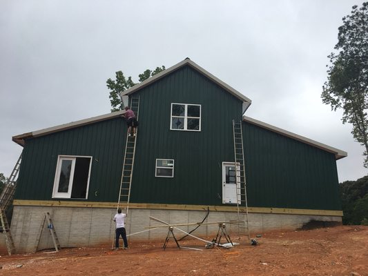 Metal panels we installed on the house around the walls