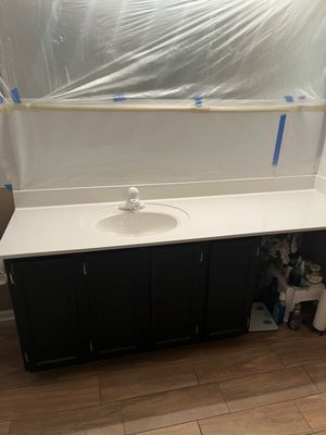 Refinished bathtub, tile and sink