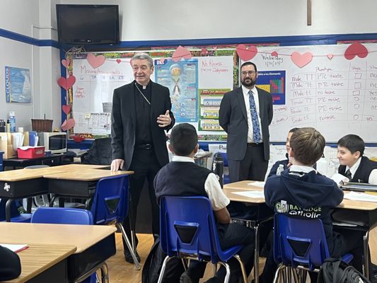 Bishop Brennan and Principal Morisi visiting classes during Catholic Schools Week