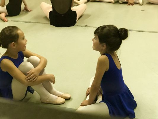 Two friends exchanging ideas on dance even at this young age!