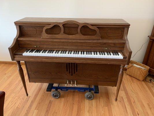 Story&Clark console piano on our 4-wheel Dollie.